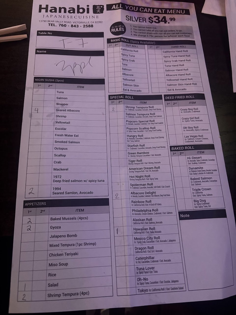 Printed sushi menu with lunch and dinner options